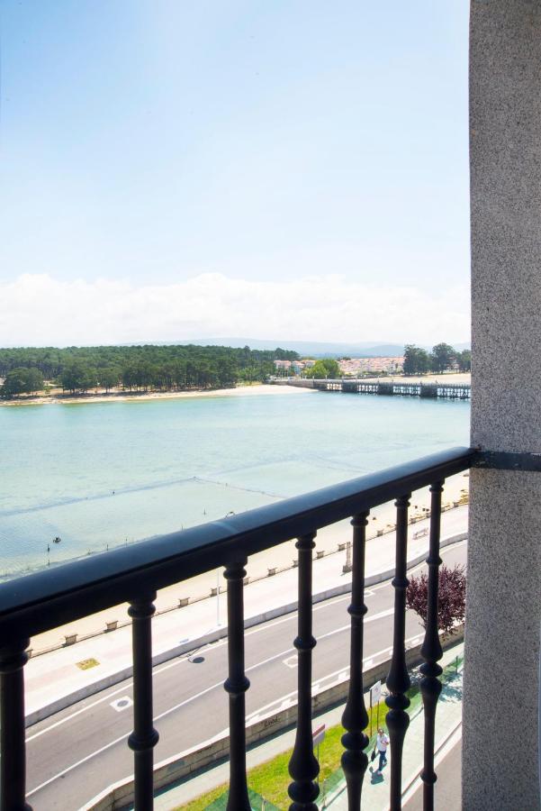 O Grove Centro Con Vistas A La Toja Parking Apartment ภายนอก รูปภาพ